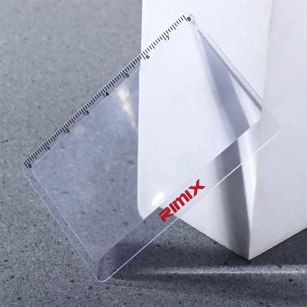 Magnifying glass on white box