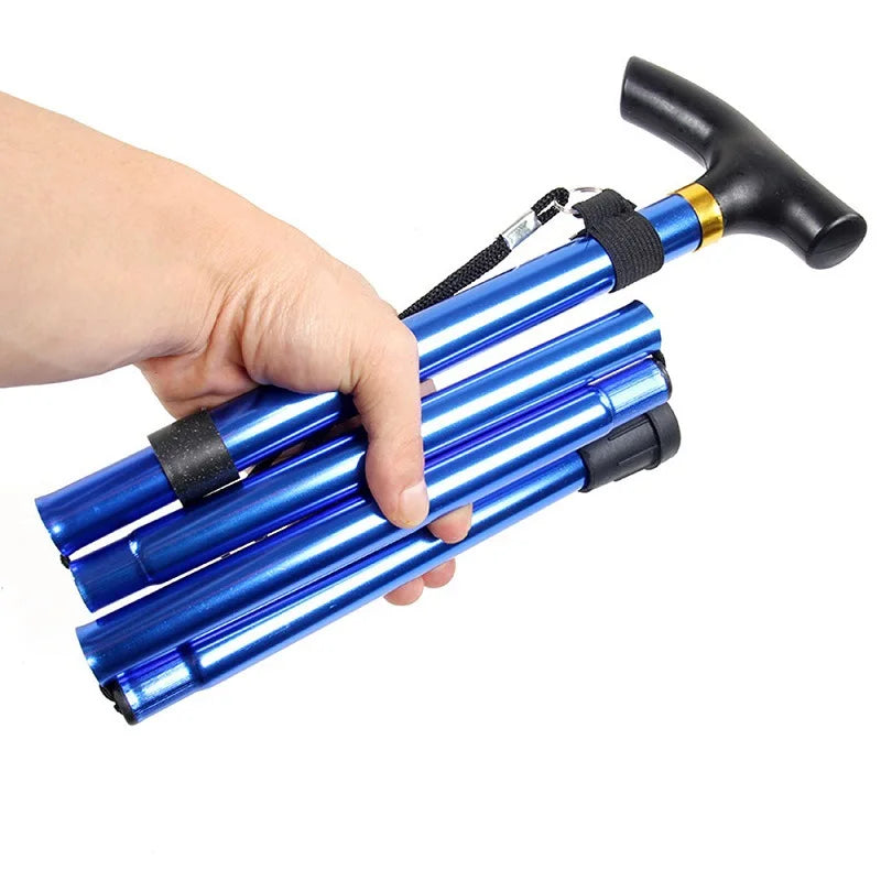 Hand holding a blue folding cane on a white background